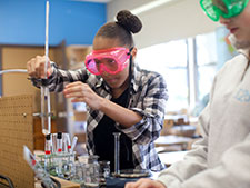 Photo of students doing a science experiment. 